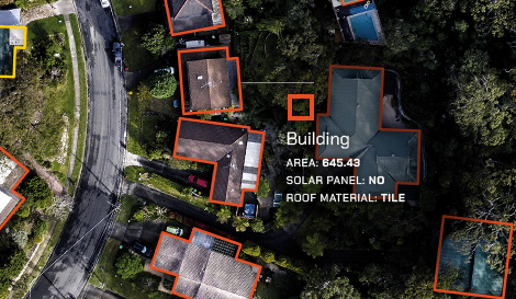 aerial shot of a suburb with houses outlined with data information such as height, pool and solar